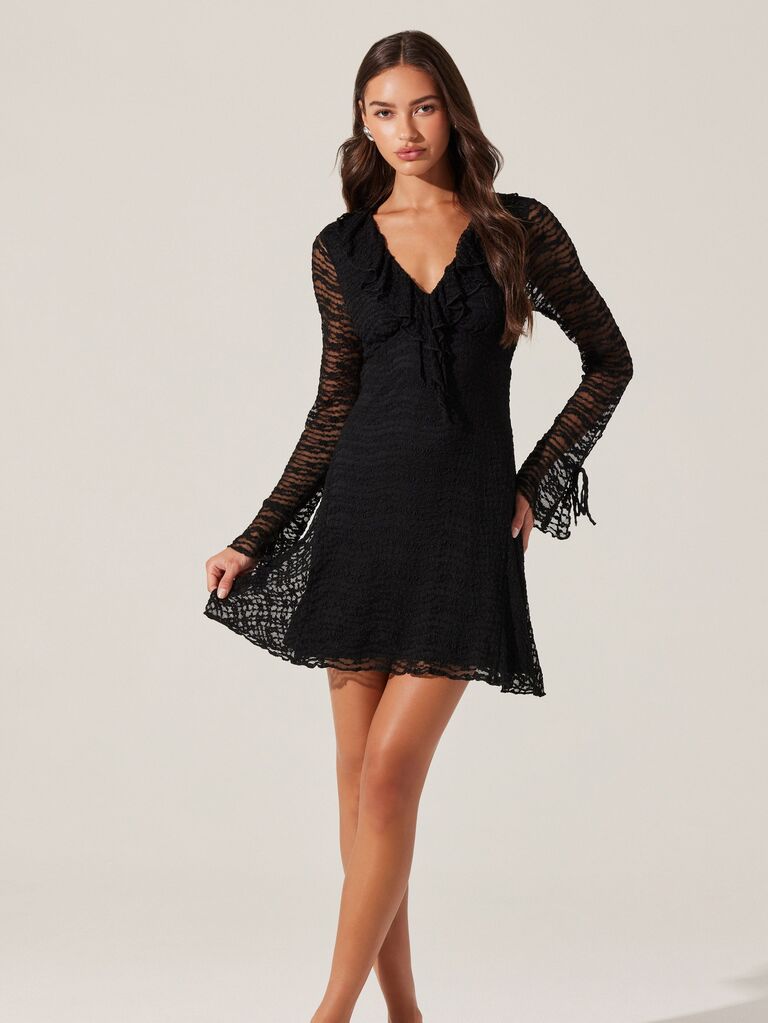Short black dress with sheer sleeves