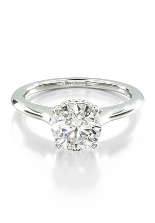 Sparkling, hand selected Pavé set diamonds adorn the basket of this slender, cathedral style engagement ring.
