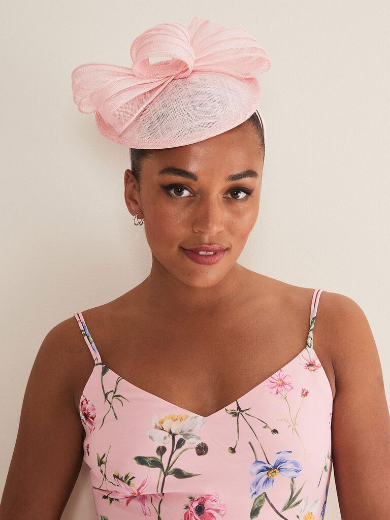 Pink wedding hat with bow by Phase Eight. 