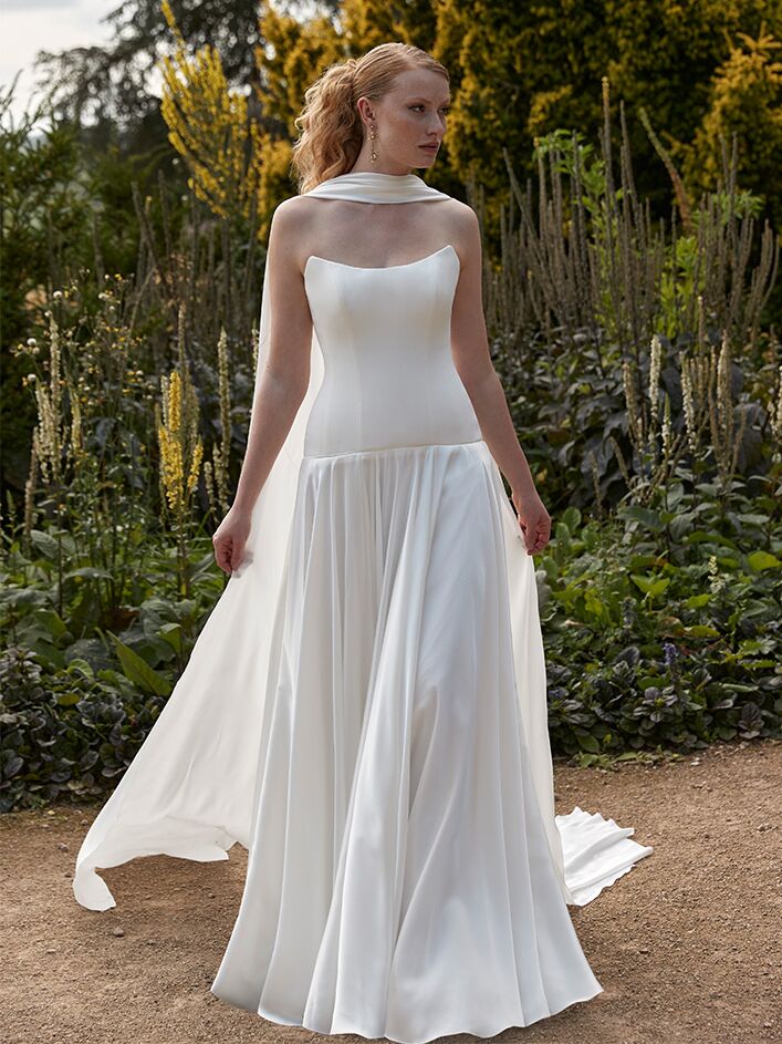 Bride wearing scarf from Sassi Holford